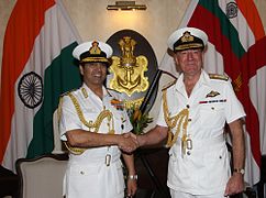 Admiral Sir George Zambellas (right) in White No. 1WC dress (bush jacket option)