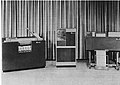 The popular IBM 1401, introduced in 1959 featured a fast card reader/punch, the IBM 1402, left