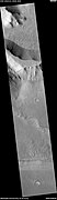 Layers in wall along Kasei Valles, as seen by HiRISE under HiWish program