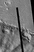 Galaxius Mons, as seen by HiRISE. The black line was a section that was not imaged. There are many more details visible on the original image.