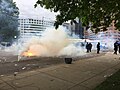 Flashbang exploding in a cloud of tear gas fired by Denver Police
