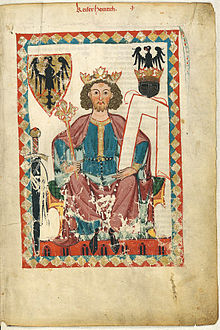 A young bearded man sitting on a throne