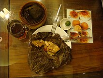 Machang (zongzi or ma-chang 肉粽, a variant of lo mai gai shaped in a triangular pattern