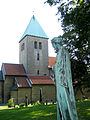 Gamle Aker kirke with sculpture