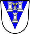 a pile—Argent, on a pile azure three towers, two and one, of the first, in the middle chief point two keys in saltire, wards upwards and inwards, or—Otley Urban District Council, England
