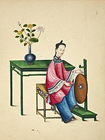 Woman playing a luo.