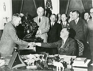 1933 Collier Trophy President Roosevelt congratulates Frank W. Caldwell of Hamilton Standard for the controllable-pitch propeller