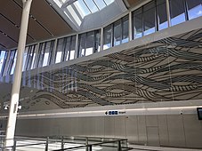 Large artwork along wall