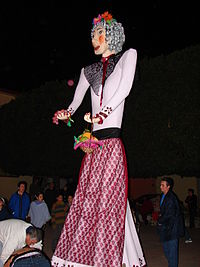 Befana, an ornately-dressed woman