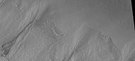 Close-up of gully aprons showing they are free of craters, hence very young. Location is Phaethontis quadrangle. Picture was taken by HiRISE under HiWish program.