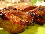 BBQ pork (叉燒) is a popular meal, with many variants in Cantonese cuisine.