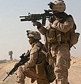 Two Marines of 3rd Battalion, 6th Marines engaging the enemy during Operation Moshtarak in Afghanistan's Helmand Province