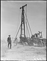 Lieutenant Commander Ralph B. Snavely of the United States Public Health Service managing the construction of a well on April 9, 1942.