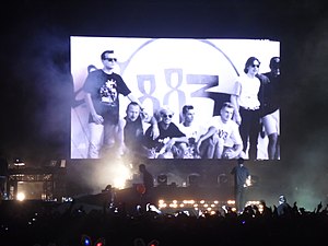 An 883 photo projected during a Max Pezzali concert in 2013