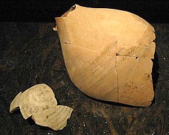 Broken ostracon from the Ai-Khanoum treasury, displaying inscription