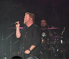 MercyMe performing in a concert.