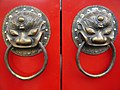 Image 50A traditional red Chinese door with Imperial guardian lion knocker (from Chinese culture)
