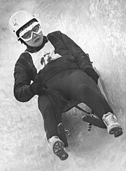 Ortrun Enderlein participating in luge, in the middle of her run