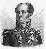 Black and white print of a bald man with a cleft chin wearing a general's uniform of the Napoleonic era.