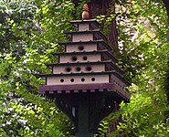 Birdhouses in Gramercy Park, New York City, note the use of different diameter entrance holes