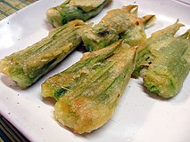 Hobak-kkot-jeon (pan-fried stuffed Cucurbita moschata flowers)
