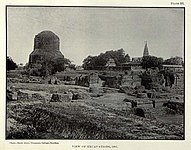 As it appeared in 1905. Camera angle from the ruins of the ancient Mulagandha Kuty Vihara towards the Dhamek Stupa; the Sri Digamber Jain temple can be seen on the right side of the photograph.