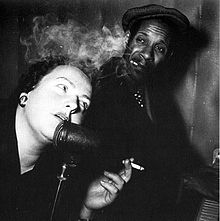 Picture, depicting Sonya Hedenbratt and Jimmy Woode in 1947 performing whilst smoking cigarettes