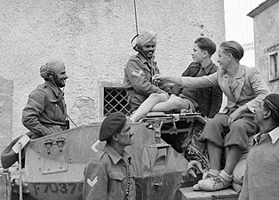 Indian Armoured Corps chat with civilians in San Felice during advance towards Sangro
