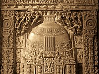 Slab of Amaravati Marbles, depicting of the Great Amaravati Stupa, with a Buddha statue at the entrance, Amaravathi, Andhra Pradesh, India