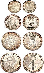 Four small silver coins, shown as a set and with both sides visible