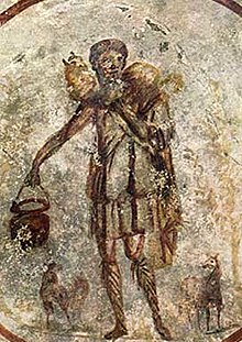 photo of very old and slightly damaged representation of Jesus as the Good Shepherd from the catacombs, made around 300 AD