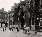 600 year-old facade of the Angel and Royal Inn showing its central entrance for coaches. c. 1900