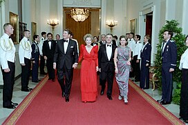 From left to right: U.S. President Ronald Reagan, his wife Nancy, Mexican President Miguel de la Madrid and his wife Paloma Cordero in Cross Hall, White House, during a state dinner.