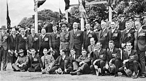 A group black and white photograph of males wearing suits and medals