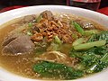 Bakso meatballs soup topped with bawang goreng