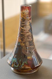 Les Baies ("Berries") vase by Muller Frères (c. 1900). Double glass, devitrified on surface, etched with hydrofluoric acid and decorated with colored enamels. (Petit Palais, Paris)