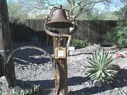 The bell of the First Church of Cave Creek.