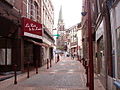Rue Neuve in the town center and the church.