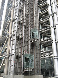 The lifts on the outside of the building