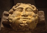 This stone carving of a Green Man from Dore Abbey, Herefordshire, England, retains some of its original colouring.
