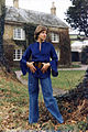 Image 101English girl in the mid-1970s wearing a wide-sleeved shirt, belted at the waist. (from 1970s in fashion)
