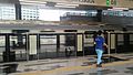 An MRT train stopping at Mutiara Damansara MRT station.
