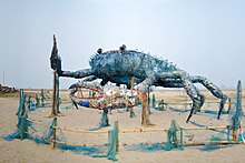 Sculpture of a crab made from discarded plastic