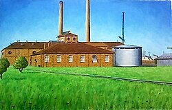 A very colorful painting with two larger buildings, with two smokestacks, and a metal storage tank .