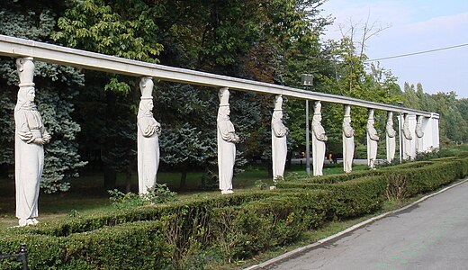 Neoclassical caryatids of the Alley of Caryatids in the Herăstrău Park, Bucharest, dressed like Romanian peasant women, sculpted by Constantin Ricci, 1939[31]