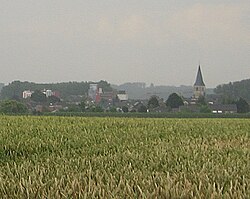 Brewery of Alken (left) and St-Aldegondis Church (right)