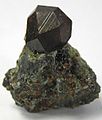 Image 21Black andradite, an end-member of the orthosilicate garnet group. (from Mineral)
