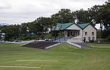 The Cricket Ground Pavilion (1898), grandstand and grounds at the Domain.