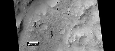 Channels (indicated with arrows), as seen by HiRISE under HiWish program