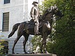 Bronze statue of a man on a horse